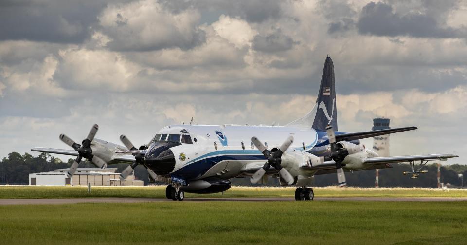 In this August 2019 photo, Kermit the Lockheed WP-3D Orion returns from a Hurricane Dorian reconnaissance mission at Lakeland Linder International Airport in Lakeland. Lakeland Ledger file photo.