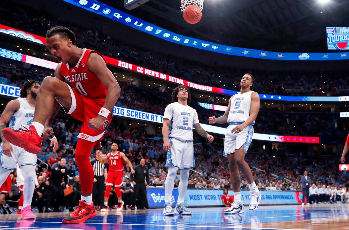 N.C. State’s DJ Horne (0) celebrates after making the basket while being fouled during N.C. State’s 84-76 victory over UNC in the championship game of the 2024 ACC Men’s Basketball Tournament at Capital One Arena in Washington, D.C., Saturday, March 16, 2024.