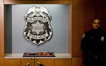 The 300-year-old Stradivarius violin that was taken from the Milwaukee Symphony Orchestra's concertmaster in an armed robbery is displayed for the media after it was recently recovered, in Milwaukee, Wisconsin February 6, 2014. REUTERS/Darren Hauck