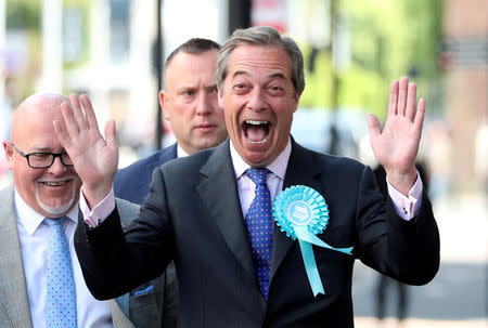 FILE PHOTO: Brexit Party leader Nigel Farage gestures as he arrives to attend a Brexit Party campaign event in Newcastle, Britain, May 20, 2019. REUTERS/Scott Heppell/File Photo