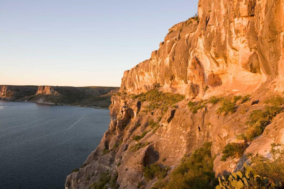Cliffs about 200 feet high, overlook the Devil's River at Lake Amistad National Recreation Area in Val Verde County, near the U.S.-Mexico border.