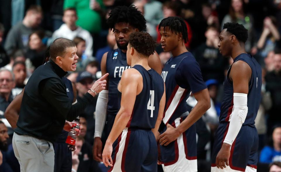 Fairleigh Dickinson Knights head coach Tobin Anderson talks to players during the NCAA MenÕs Basketball Tournament game against the Purdue Boilermakers, Friday, March 17, 2023, at Nationwide Arena in Columbus, Ohio. Fairleigh Dickinson Knights won 63-58.