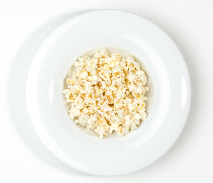 <div class="caption-credit"> Photo by: Jeffrey Schad</div><b>Microwave Popcorn</b> <br> <br> Boxes of nukable corn are almost 25 cents more per ounce than loose kernels. <br> <br> <b>Super Saver Solution</b> Drop 2 tbsp kernels into a paper lunch bag (makes 2 to 3 cups popped), fold over the top and microwave two to three minutes, or until the popping stops. <br> <br> <b>More from <i>SELF</i>: <br></b> <a rel="nofollow noopener" href="http://www.self.com/beauty/2013/08/gorgeous-hair-diet-slideshow?mbid=synd_yshine" target="_blank" data-ylk="slk:What to Eat for Gorgeous Hair;elm:context_link;itc:0;sec:content-canvas" class="link ">What to Eat for Gorgeous Hair</a> <br> <a rel="nofollow noopener" href="http://www.self.com/d10detox?mbid=synd_yshine" target="_blank" data-ylk="slk:7-Day Detox: How to Lose Fat Fast;elm:context_link;itc:0;sec:content-canvas" class="link ">7-Day Detox: How to Lose Fat Fast</a> <br>