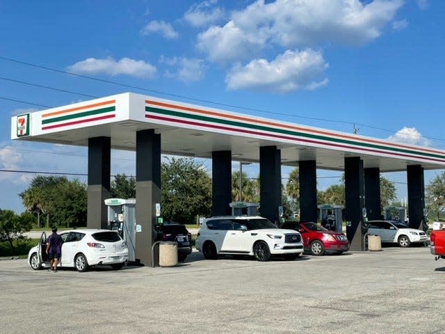 The gas pumps at this Fort Myers 7-11 were busy on Friday afternoon, Sept. 23, 2022 as motorists filled up their tanks ahead of the possibility of a hurricane hitting Southwest Florid.