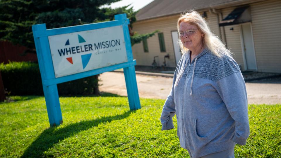 Angela DuBois heads back to Wheeler Mission on Friday, Aug. 18, 2023.