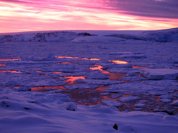 This twilight photo, taken at Palmer Station in Antarctica, hints at what the melting edge of an ice-covered hemisphere might look like around a tidally locked, terrestrial planet orbiting a red dwarf star. Much of such a hypothetical planet's