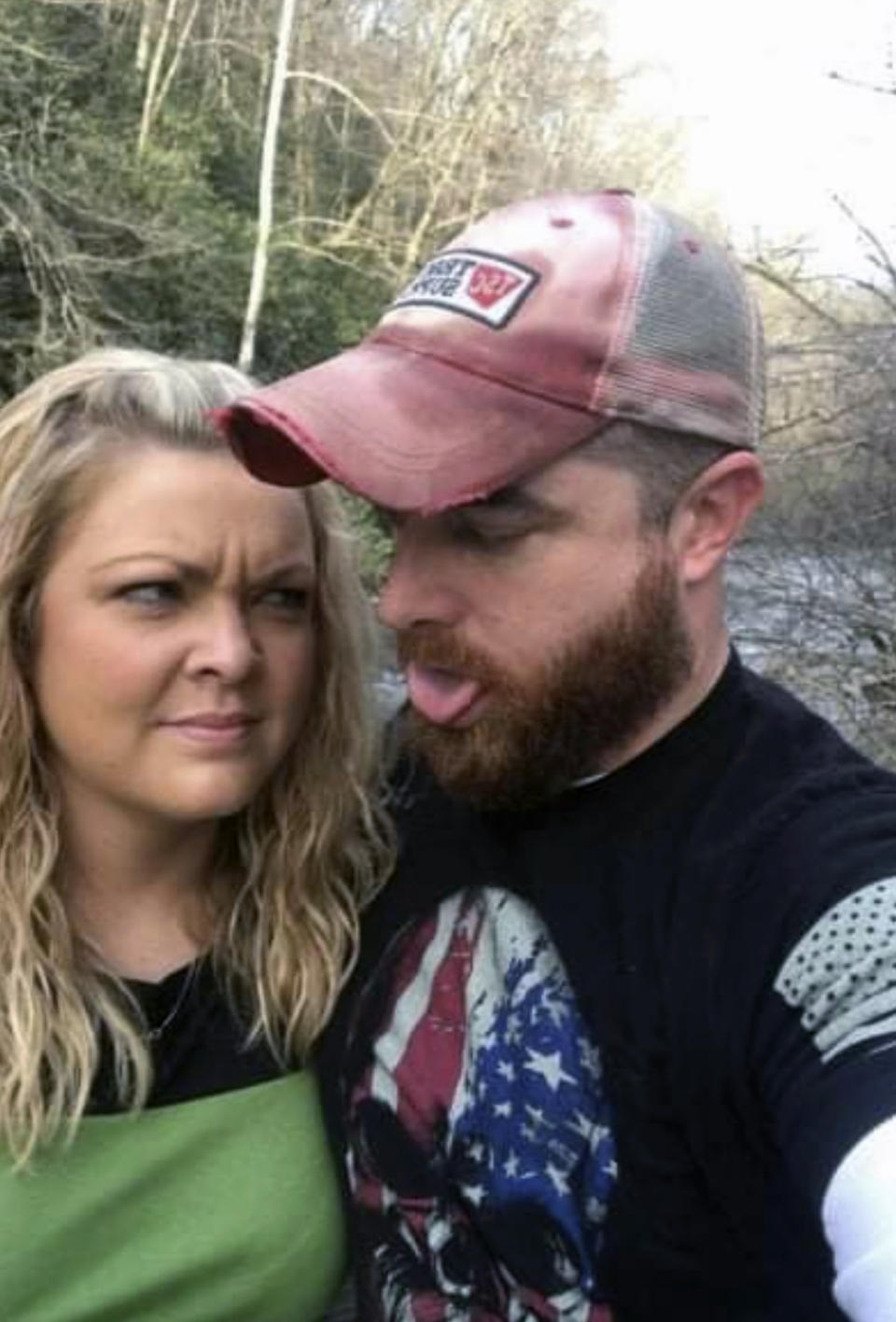 This photo provided by Christina Tidmore shows Christina and Josh Tidmore, Saturday, Feb. 16, 2019. 