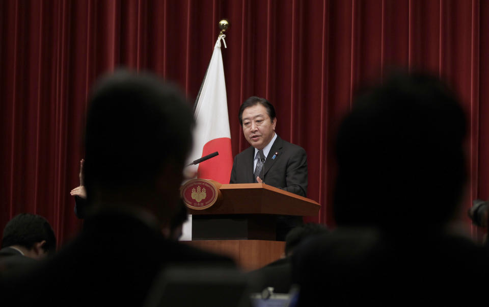 Japan's Prime Minister Yoshihiko Noda speaks during a press conference at his official residence in Tokyo, Friday, March 30, 2012. Japanese Prime Minister Noda vowed to stake his political career to achieve the sales tax increase Friday as his Cabinet endorsed a legislation to help counter the country's fiscal deficit. (AP Photo/Shizuo Kambayashi)