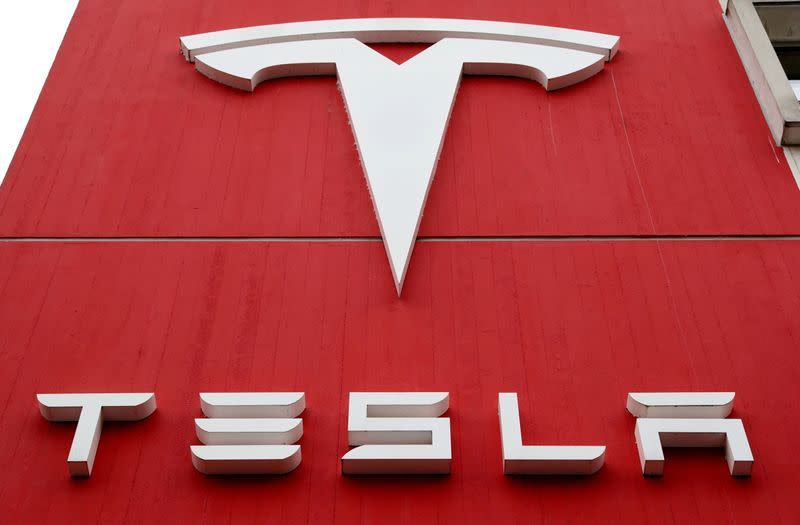 FILE PHOTO: The logo of car manufacturer Tesla is seen in Bern