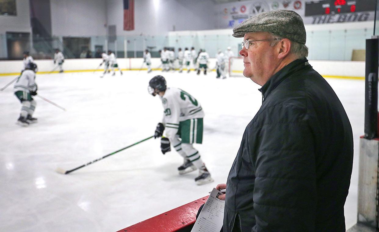 Rams coach Dan Connolly watches his team warm up. He is in his 24th season as coach.Marshfield hosted Xaverian in boys hockey at The Bog in Kingston on Thursday February 23, 2023 