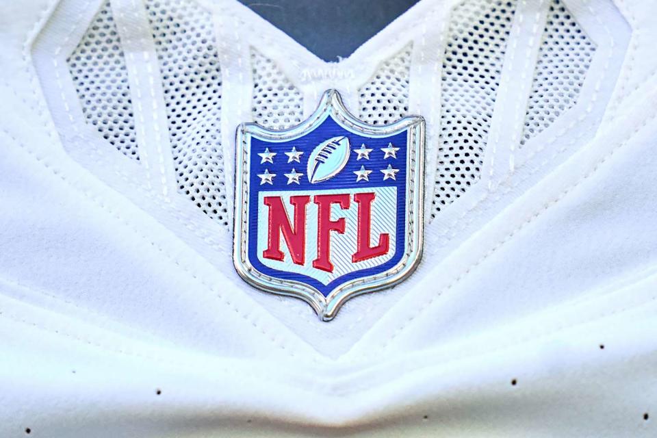 <p>Robin Alam/ISI Photos/Getty</p> A detail view of the NFL rest logo is seen on an Arizona Cardinals jersey in action during a game between the San Francisco 49ers and the Arizona Cardinals at State Farm Stadium on December 17, 2023