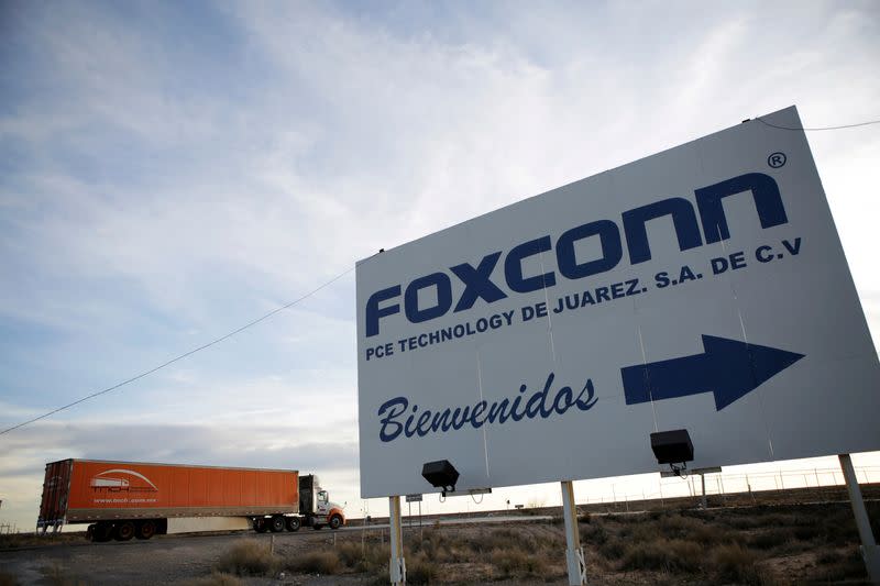 FILE PHOTO: A sign announces the manufacturing complex of Foxconn PCE Technology, in Ciudad Juarez