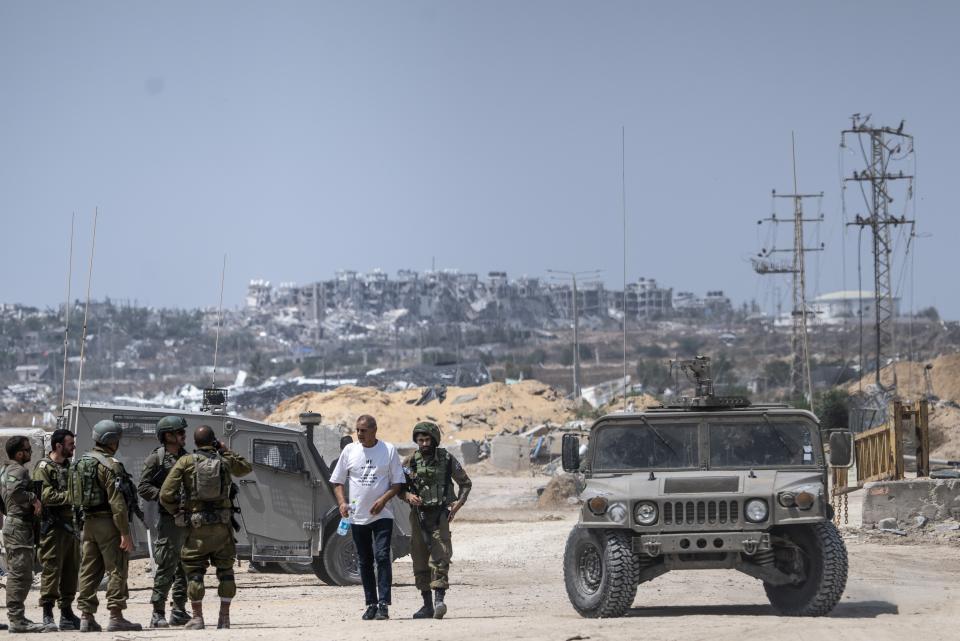 BEIT HANOUN, GAZA - MAY 1: Israeli army supervises the entrance of the humanitarian aids from Jordan that is being loaded onto trucks, to enter northern Gaza Strip through the Beit Hanoun (Eretz) Border Crossing on May 1, 2024 in Beit Hanoun, Gaza. (Photo by Mostafa Alkharouf/Anadolu via Getty Images)