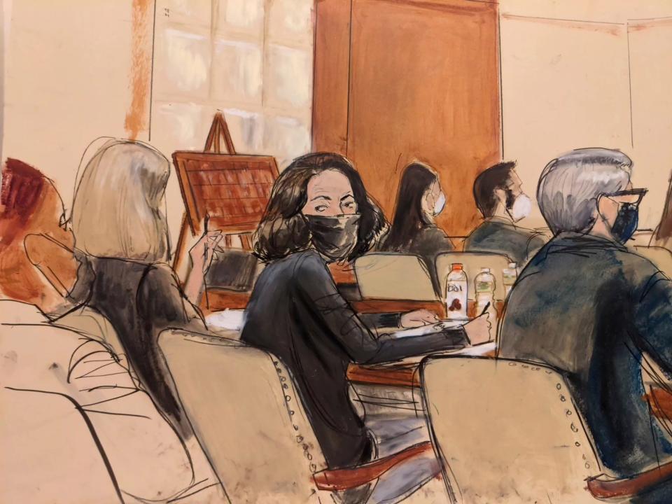 In this courtroom sketch, Ghislaine Maxwell looks over her shoulder to the courtroom audience prior to the start of jury selection in her trial on Nov. 16, 2021, in New York. Prospective jurors got their first glimpse of Maxwell, the longtime companion of Jeffrey Epstein who is accused of helping him sexually abuse girls and women.