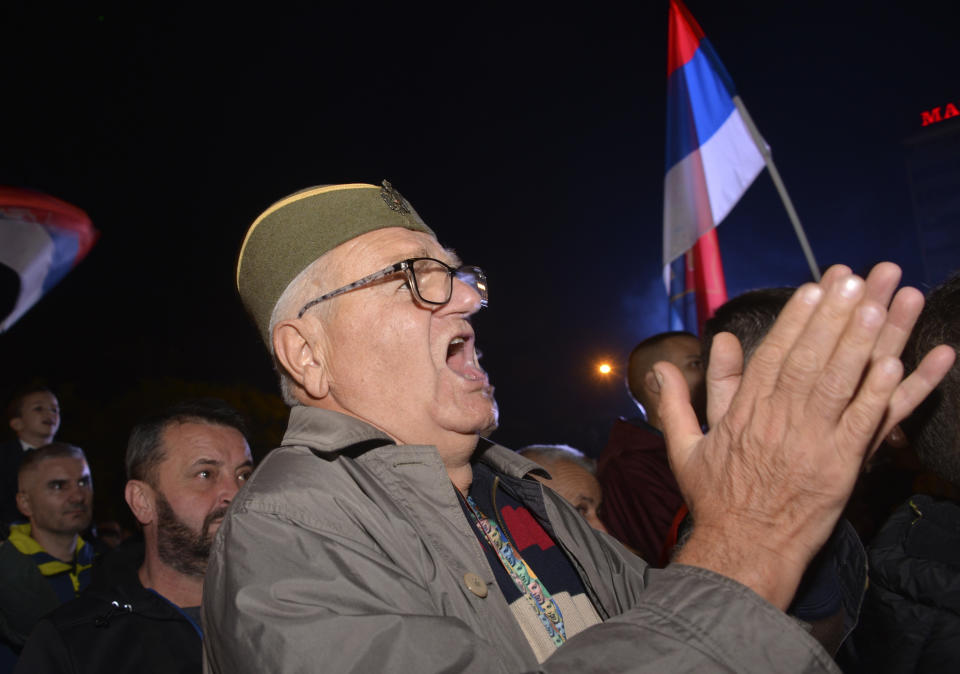 A man wearing a traditional Serbian hat shout slogans during a protest against alleged election fraud in the general elections in the Bosnian town of Banja Luka, 240 kms northwest of Sarajevo, Sunday, Oct. 9, 2022. Thousands on Sunday rallied in Bosnia for the second time in a week, alleging that pro-Russian Bosnian Serb leader Milorad Dodik rigged a ballot during a general election in the Balkan country last weekend. (AP Photo/Radivoje Pavicic)