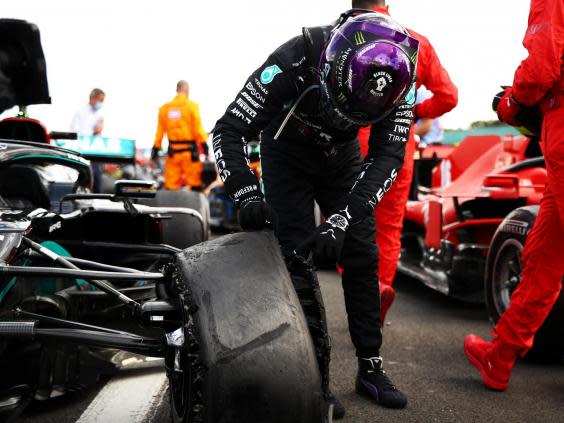 Hamilton was lucky to make the finish after suffering a last-lap puncture (Getty)