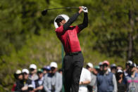 Tiger Woods tees off on the fifth hole during the final round at the Masters golf tournament on Sunday, April 10, 2022, in Augusta, Ga. (AP Photo/Jae C. Hong)