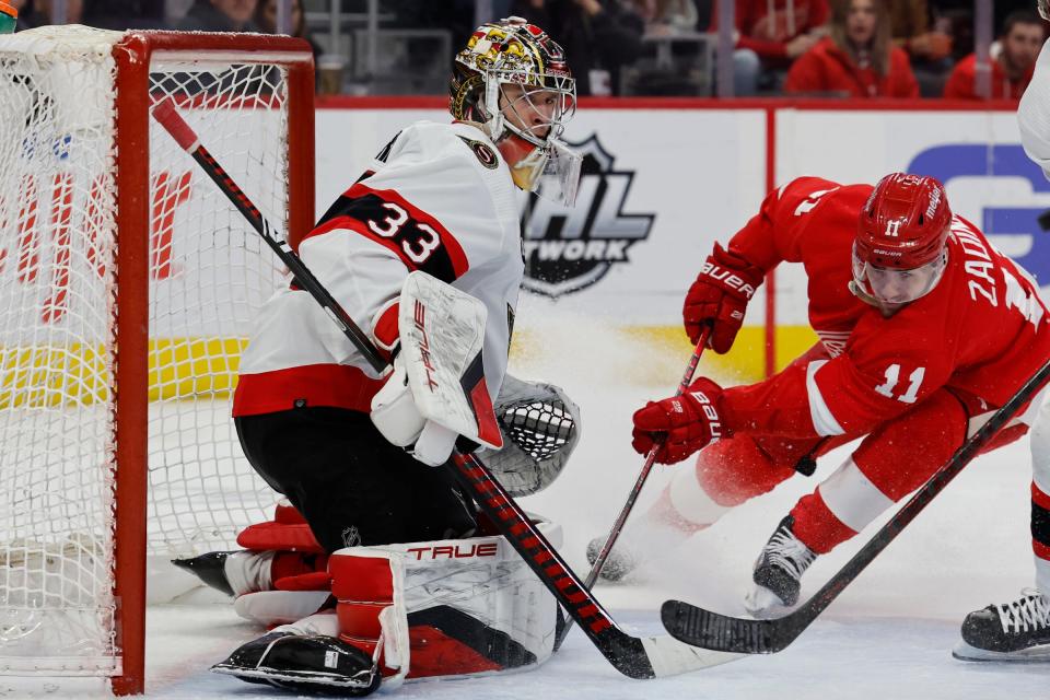 Detroit Red Wings right wing Filip Zadina tries to score on Ottawa Senators goaltender Mads Sogaard in the second period at Little Caesars Arena, April 1, 2022.