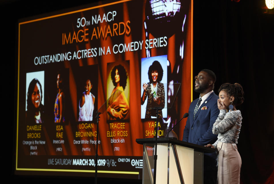 Logan Browning, right, reacts as Winston Duke announces her as a nominee for the 50th annual NAACP Image Awards during TV One's Winter Television Critics Association Press Tour on Wednesday, Feb. 13, 2019, in Pasadena, Calif. (Photo by Chris Pizzello/Invision/AP)