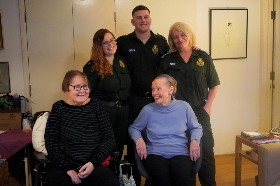 Joan (L) and Louise Higgs (R) reunited with ambulance crews  (London Ambulance Service)