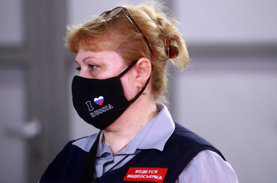 MOSCOW, RUSSIA - JUNE 9, 2020: A staff worker in a face mask at a station of the Moscow Underground (Metro) on the first day of lockdown being lifted in the capital during the pandemic of the novel coronavirus disease (COVID-19). People, including those over 65 and people with health conditions, are allowed to leave home, however wearing face masks and observing social distancing rules in public remains mandatory. Commuters and motorists no longer need to apply for digital permits to use public transport or own motor vehicles. Service businesses, such as hairdressers', beauty salons, photo studios, employment agencies and various public organisations are resuming their work. As of 9 June 2020, Russia has reported more than 477,000 confirmed cases of the novel coronavirus infection, with more than 197,000 confirmed cases in Moscow. Sergei Fadeichev/TASS (Photo by Sergei Fadeichev\TASS via Getty Images)