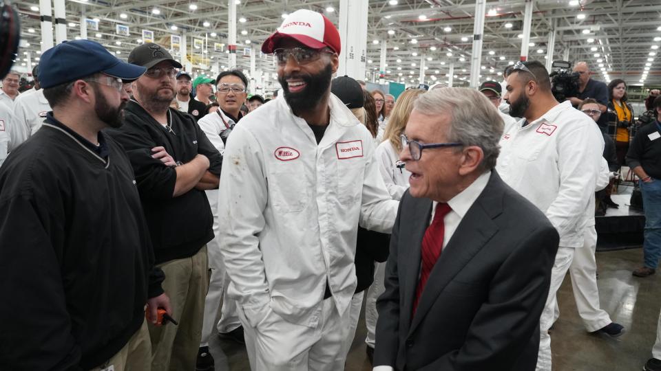 Ohio Governor Mike DeWine talks with Willie Alford as Honda introduces its new version of the Accord made at the Marysville Auto Plant. The Thursday event also marked the 40th anniversary of Honda making cars in Ohio. Alford said he and governor talked about the fact that Alford has only worked at the plant for nine weeks.