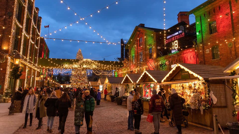 The Distillery District Winter Village in Toronto will kick off with a tree lighting ceremony on November 16. - Scott Heaney/iStock Editorial/Getty Images