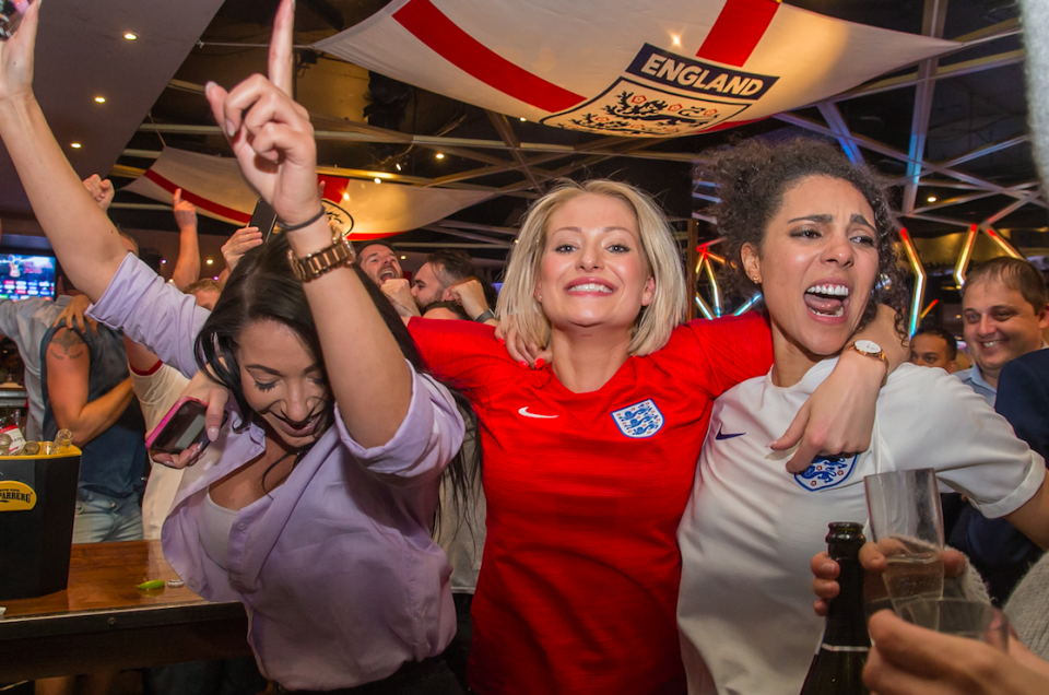 <p>Fans celebrate their team’s victory at Mooch Bar in Birmingham.<br> (Picture: SWNS) </p>