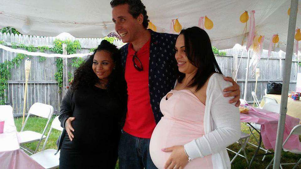 Ari Nagel poses with two pregnant women he donated sperm to