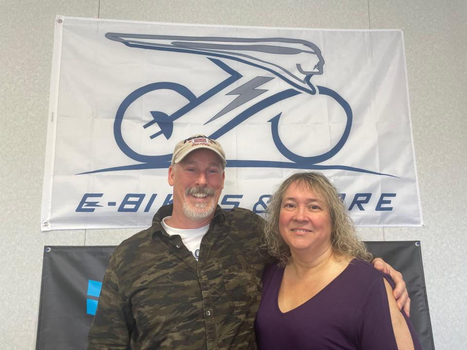 Kevin Owens, left, and Candy Tilley at E-Bikes and More on March 24, 2023. They will host a grand opening and ribbon-cutting on April 5.