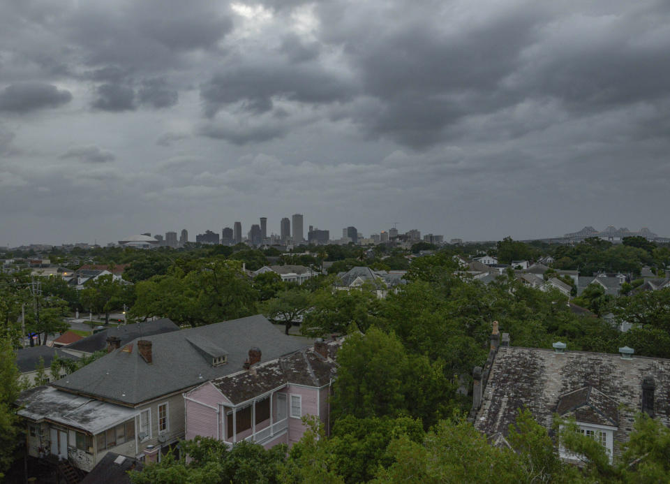 Storm clouds gather above New Orleans (Matthew Hinton/AP)