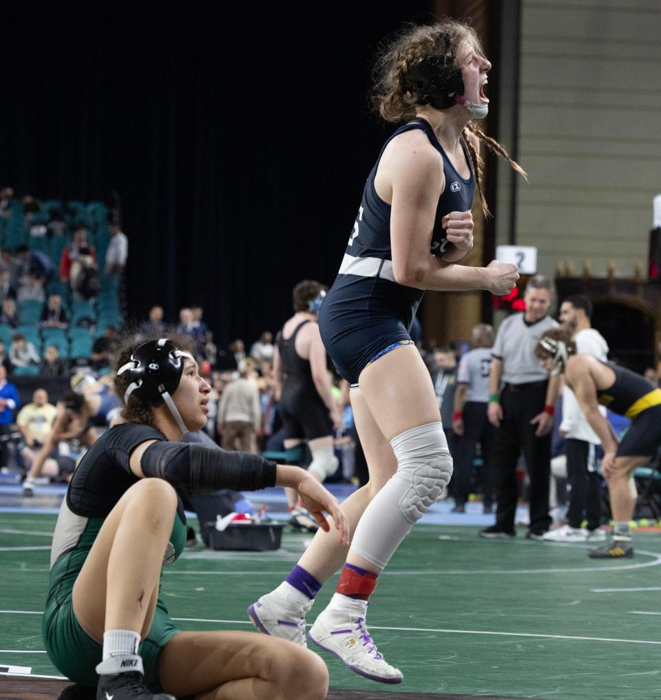 Middletown South's Thea Rowland celebrates after she defeated DePaul's Olivia Georges 4-3 in the NJSIAA 145-pound semifinal.