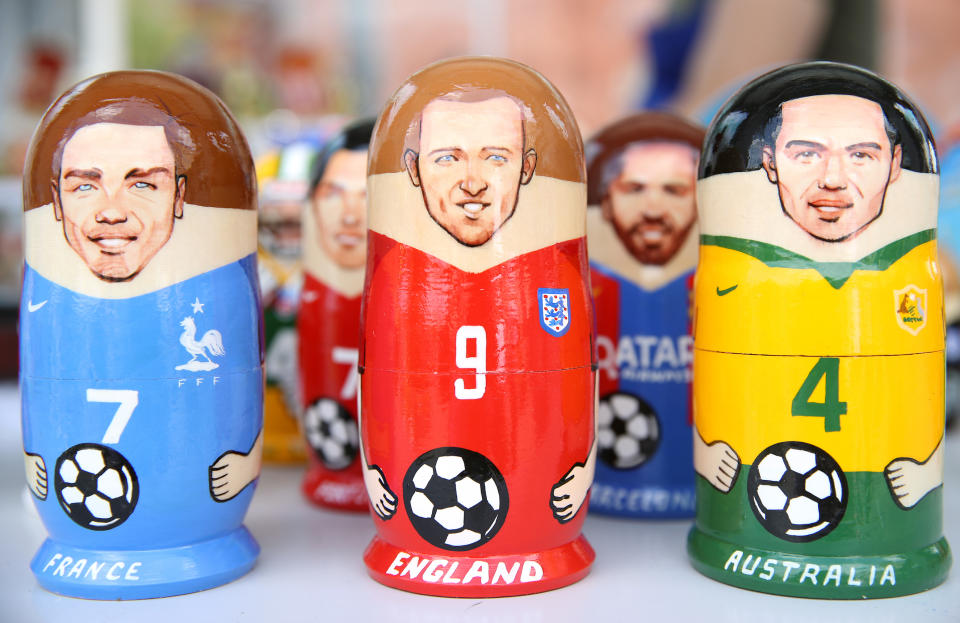 Cashing in: Harry Kane, Antoine Griezmann and Brazil’s Pedro Geromel feature on World Cup souvenirs on sale in Moscow. (PA)