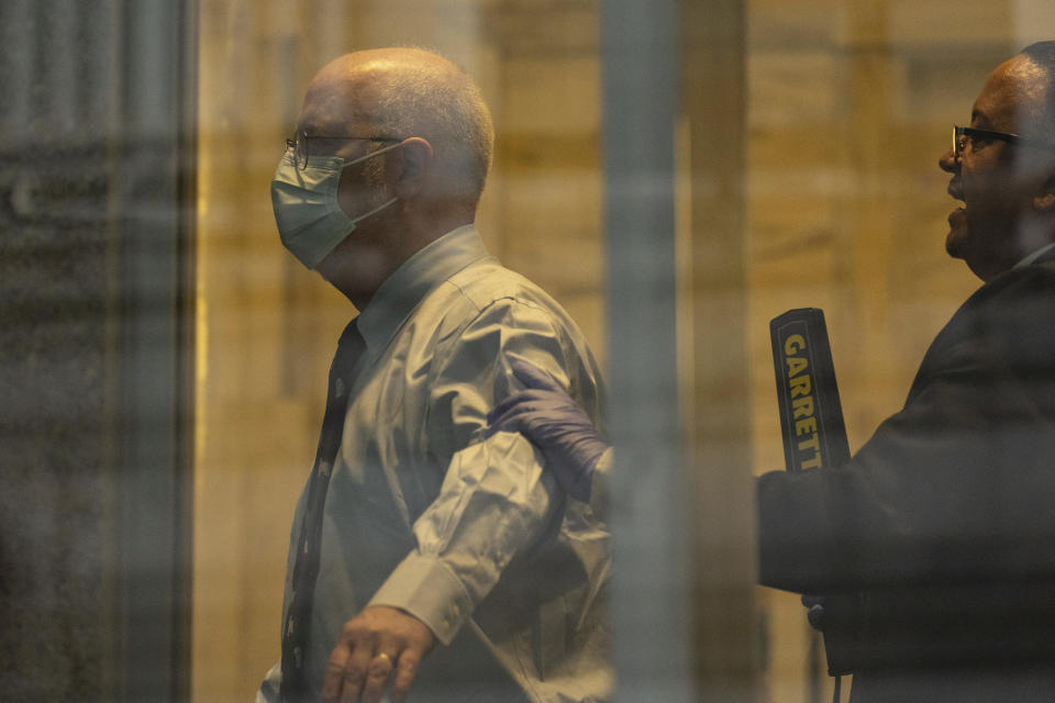 Robert Hadden waits in line at the federal court, Monday, Jan. 9, 2023, in New York. (AP Photo/Yuki Iwamura)