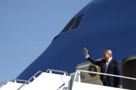 President Donald Trump arrives at Moffett Federal Airfield to attend a fundraiser, Tuesday, Sept. 17, 2019, in Mountain View, Calif. (AP Photo/Evan Vucci)