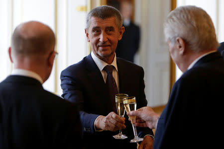 Czech Republic's Prime Minister Bohuslav Sobotka (L-R), former Finance Minister Andrej Babis and President Milos Zeman toast at Prague Castle in Prague, Czech Republic, May 24, 2017. REUTERS/David W Cerny