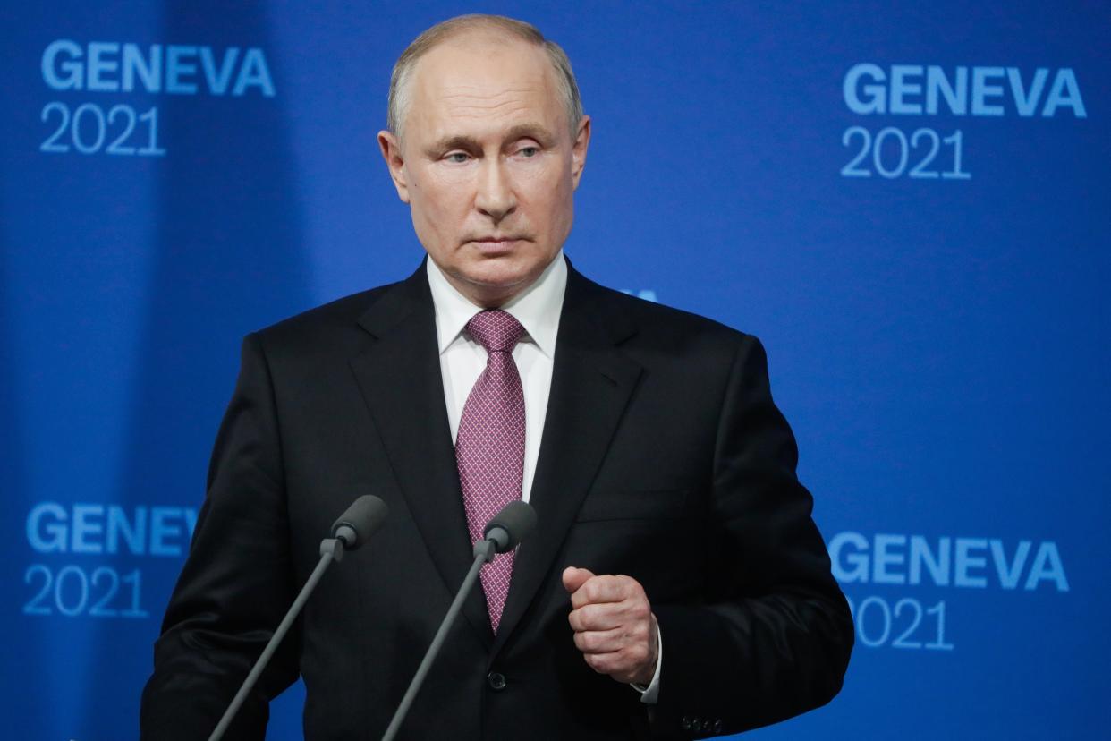 Russian President Vladimir Putin holds a news conference after the US-Russia summit between himself and President Joe Biden at the Villa La Grange, in Geneva (EPA)