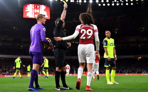 Matteo Guendouzi of Arsenal is shown a yellow card - Credit: Getty Images