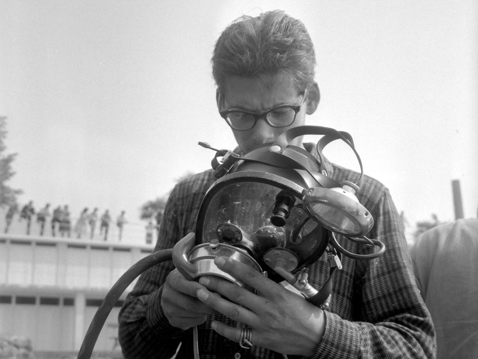 Hannes Keller inspecting a diving mask in 1960.