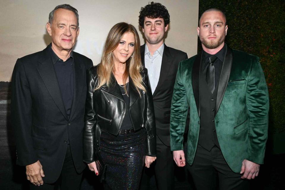 <p>Michael Buckner/Variety via Getty </p> Tom Hanks, Rita Wilson, Truman Hanks and Chet Hanks at the premiere of "Masters of the Air" held at Regency Village Theatre on January 10, 2024 in Los Angeles, California.