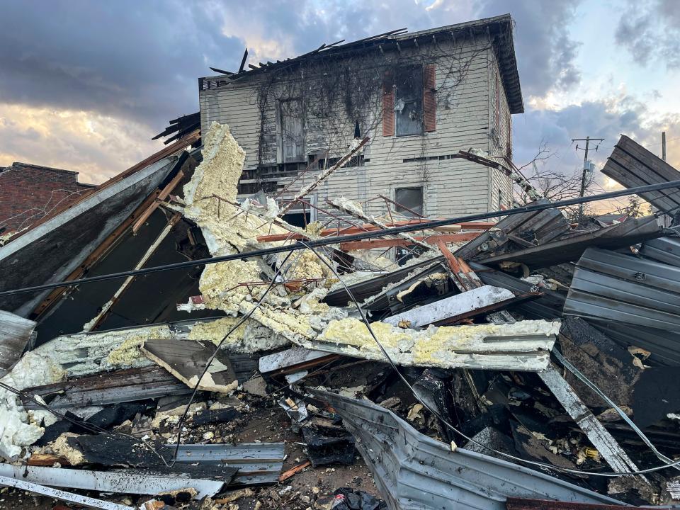 A damaged structure and debris are seen in the aftermath of severe weather on Thursday, in Selma, Ala. A large tornado damaged homes and uprooted trees in Alabama on Thursday as a powerful storm system pushed through the South.