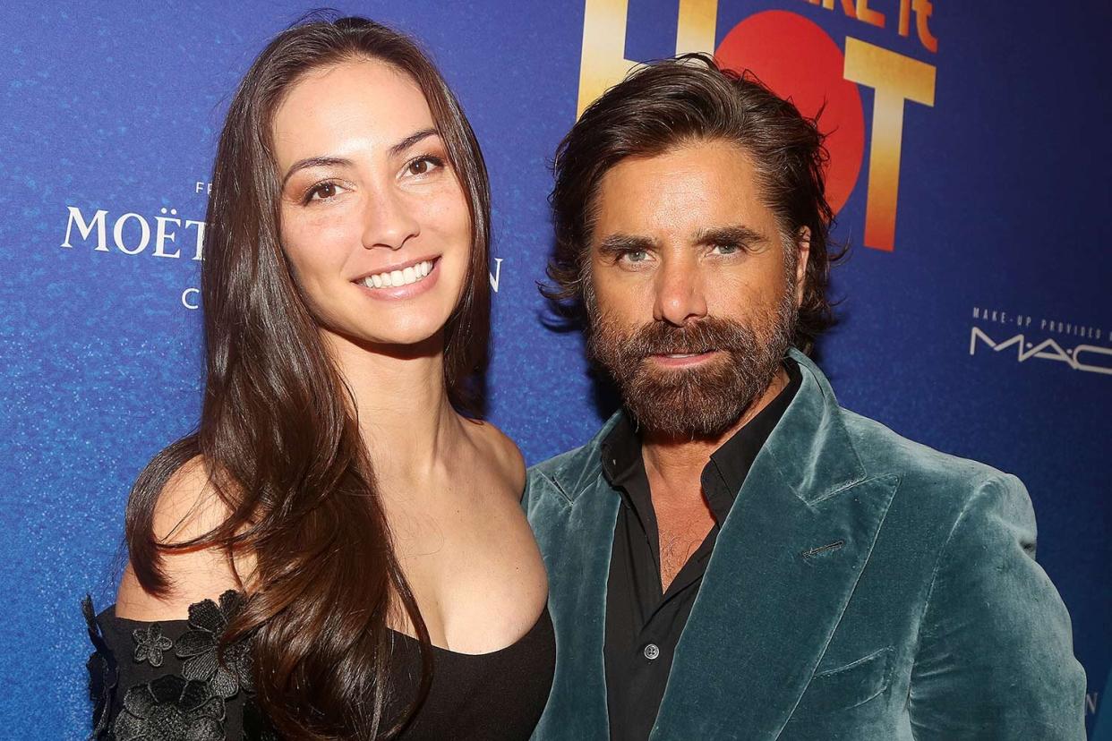 Caitlin McHugh Stamos and John Stamos pose at the opening night of the new musical "Some Like It Hot!" on Broadway at The Shubert Theatre on December 11, 2022 in New York City.