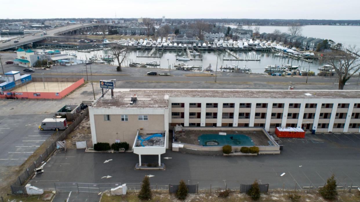 A new roof covers the former Neptune Motor Lodge on New York Avenue in Neptune Monday, February 7, 2023.  The structure has sat abandoned since March 2021, when a powerful storm tore off parts of the roof from the motel.