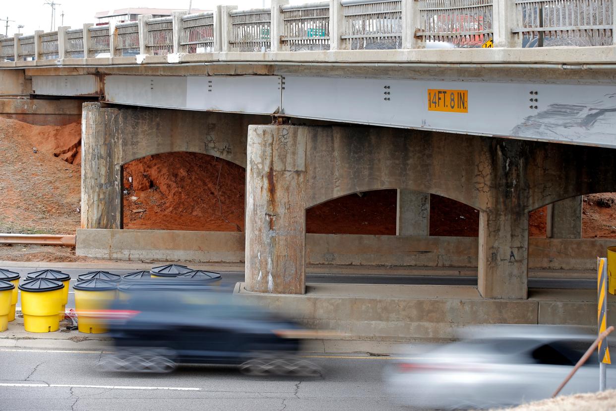 Vehicles travel under a May Avenue bridge along Northwest Expressway on Jan. 17, 2023, in Oklahoma City.