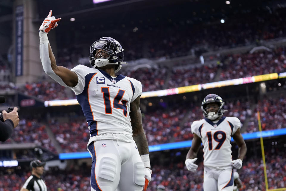 Denver Broncos wide receiver Courtland Sutton (14) celebrates after catching a 45-yard touchdown pass against the Houston Texans in the second half of an NFL football game Sunday, Dec. 3, 2023, in Houston. (AP Photo/Eric Christian Smith)