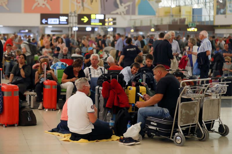 Stranded passengers wait at Las Palmas Airport in Gran Canaria, as a sandstorm locally known as ?calima? closed air traffic in the Canary Islands