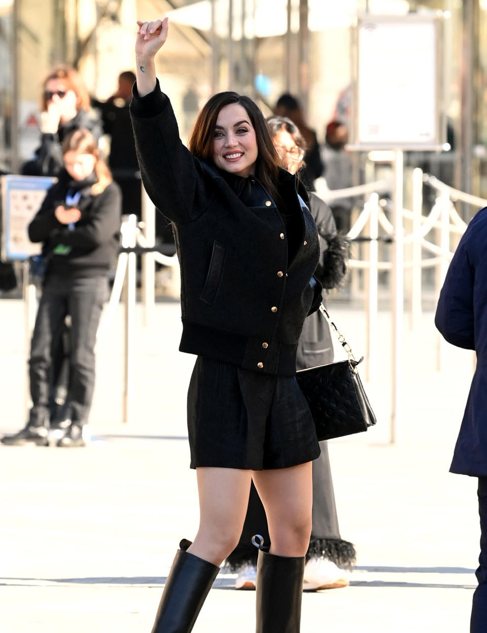 <p>Ana de Armas greets fans outside the Louis Vuitton show during Paris Fashion Week on Oct. 4. </p>