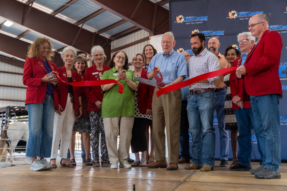 The Amarillo Chamber of Commerce cuts the ribbon Friday at the grand opening of the Pavilion at the Santa Fe Depot in downtown Amarillo.