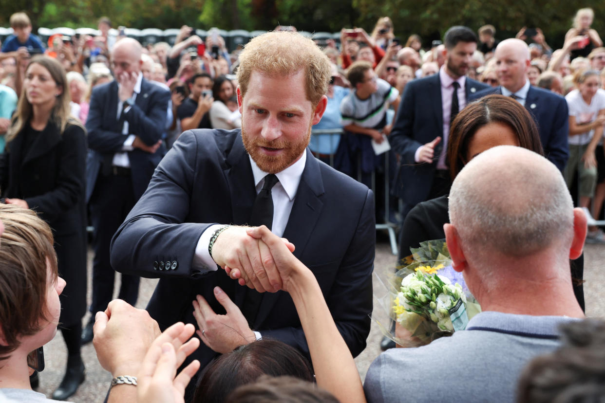 Britain's Prince Harry greets people outside Windsor Castle, following the passing of Britain's Queen Elizabeth, in Windsor, Britain, September 10, 2022. REUTERS/Paul Childs
