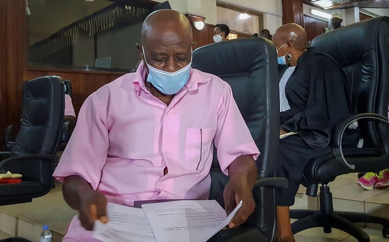 Paul Rusesabagina, portrayed as a hero in a Hollywood movie about Rwanda's 1994 genocide, sits inside a courtroom in Kigali